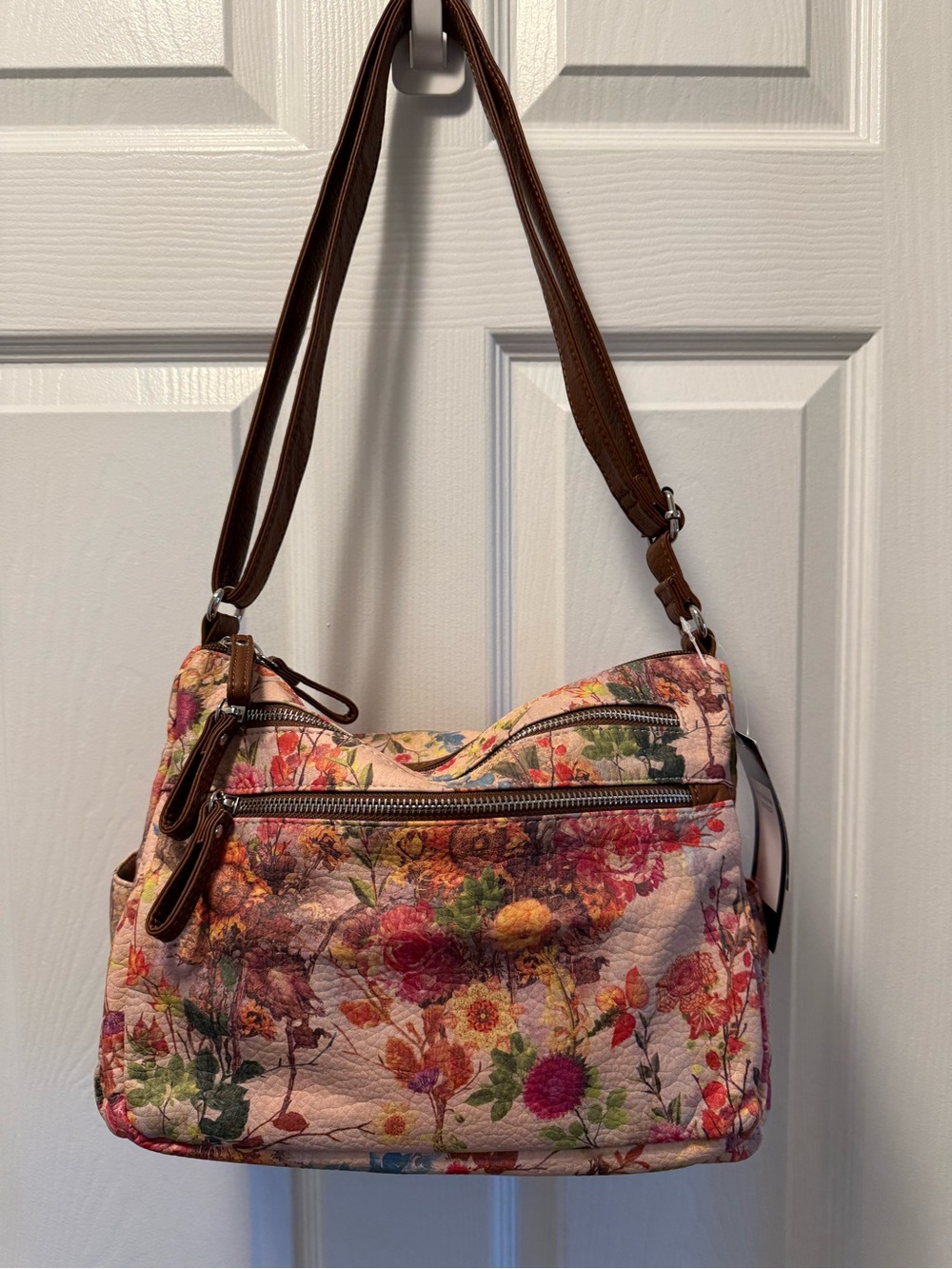 Bueno floral print crossbody bag,  a watercolor-style design w/brown straps